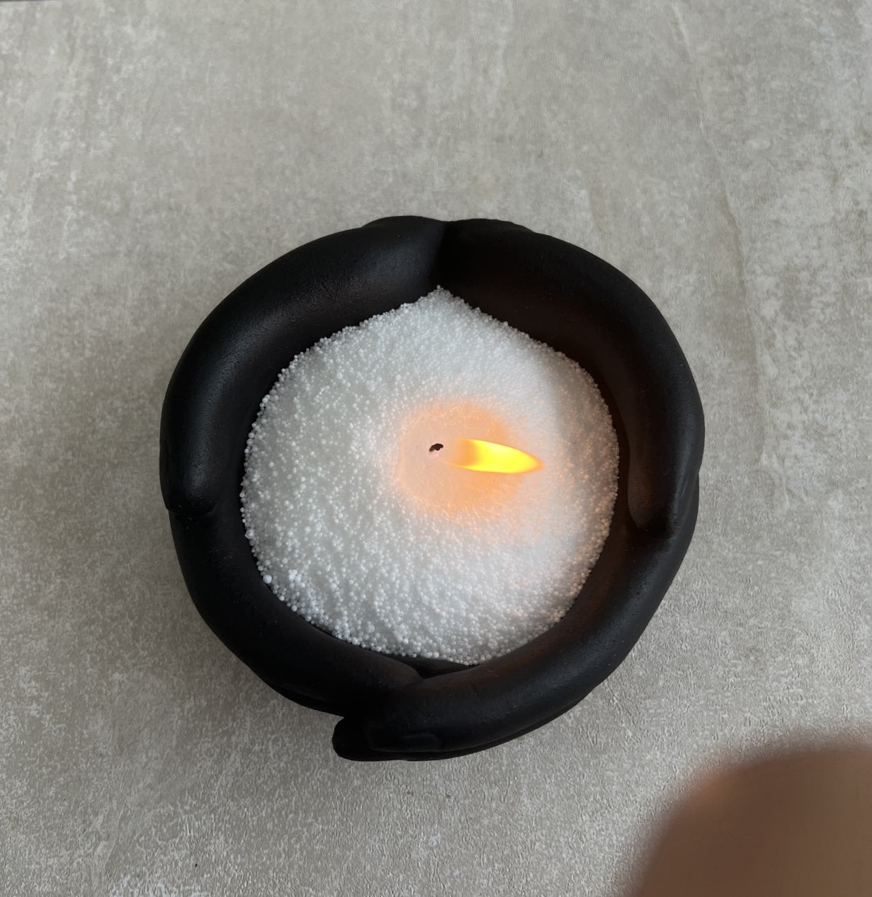Black Hand Warmer with Wax Pearls